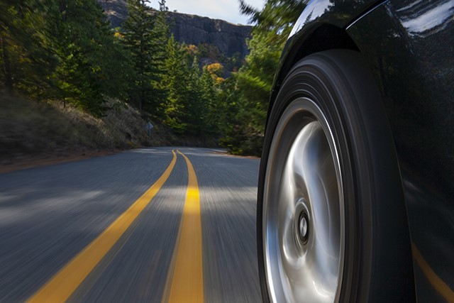 car driving down the road